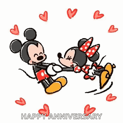 Mickey Mouse And Minnie Mouse Are Kissing Each Other On The Cheek . GIF