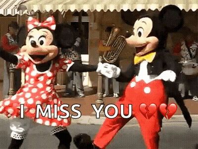 Mickey Mouse And Minnie Mouse Dancing Holding Hands GIF