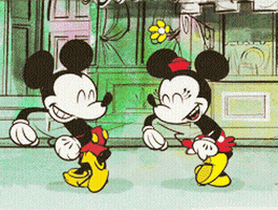 Mickey Mouse And Minnie Mouse Dancing In Front Of Store GIF