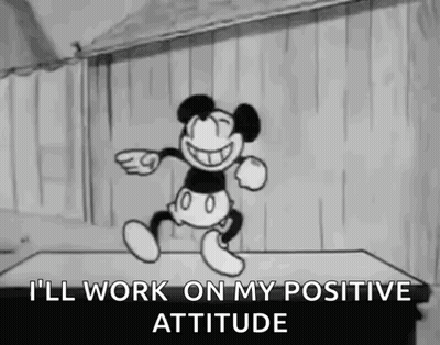 Mickey Mouse Is Dancing And Smiling In A Black And White Cartoon . GIF