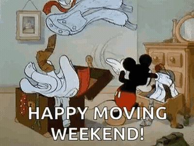Mickey Mouse Is Sitting On A Suitcase With Clothes Flying Out Of It . GIF