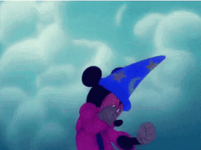 Mickey Mouse Is Wearing A Blue Wizard Hat And A Pink Robe GIF