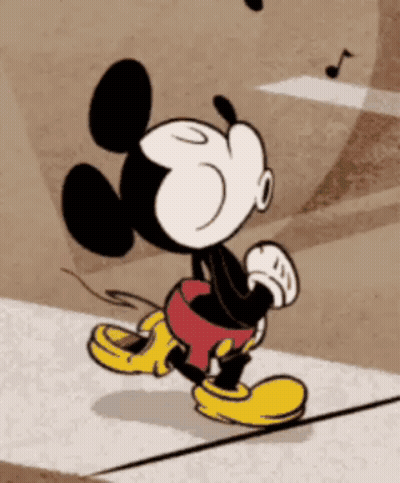 Mickey Mouse Walking Down Sidewalk GIF