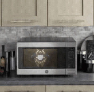 Microwave Oven With Cartoon Character On Screen GIF