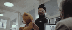 Mike Epps Hugging Big Stuffed Toy  GIF