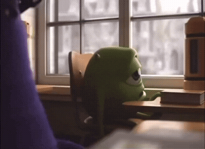 Mike From Monsters Inc Sitting At Desk Looking Out Window GIF