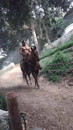 Mike O'Hearn Half Naked Horseback Ride GIF