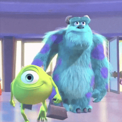 Mike Wazowski And Sulley From Monsters Inc Standing Next To Each Other GIF