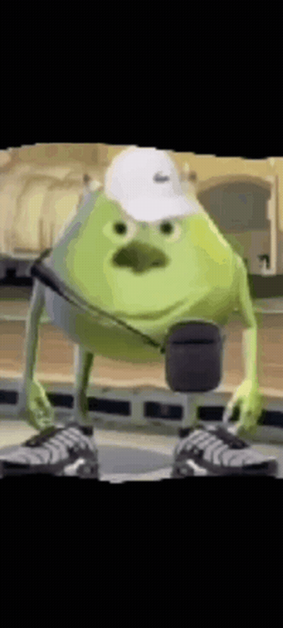 Mike Wazowski From Monsters Inc Is Wearing A White Hat And Black Shoes . GIF