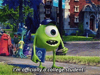 Mike Wazowski Says I'm Officially A College Student Holding A Book GIF
