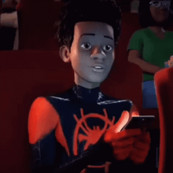 Miles Morales Spiderman Watching Movie GIF