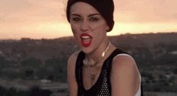 Miley Cyrus Playing With Tongue GIF