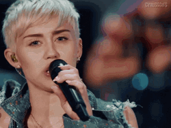 Miley Cyrus Pointing While Singing GIF