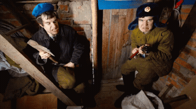 Military Man Holding Hammer And Man With Saw GIF