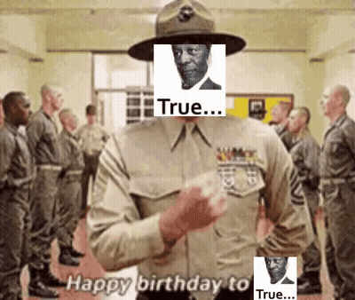 Military Man Holding Picture Of Man In Hat With 'True GIF