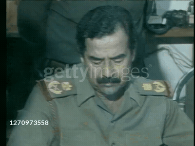 Military Man With Mustache In Front Of Getty Image GIF