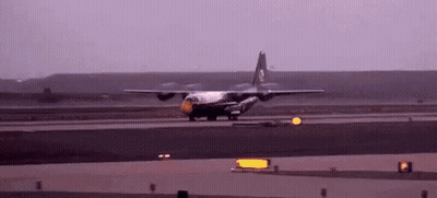 Military Plane Taking Off At Sunset GIF