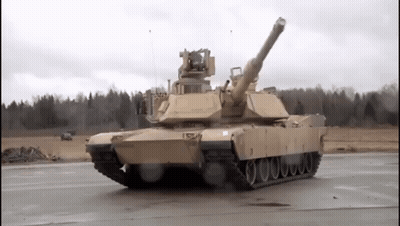 Military Tank Driving On Road With Trees GIF