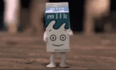 Milk Carton With Face And Legs GIF