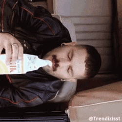 Milk Facial In Car Drinking GIF