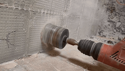 Milwaukee Brand Drill Drilling Into Wall GIF