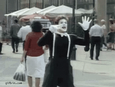 Mime Man Waving At Crowd GIF