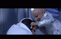 Mini Me Beating Austin Powers GIF
