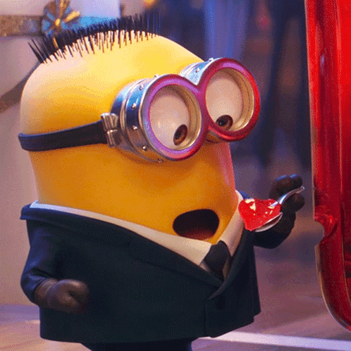 Minion In Suit Holding Spoon GIF
