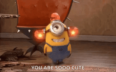 Minion Standing In Front Of Cactus GIF