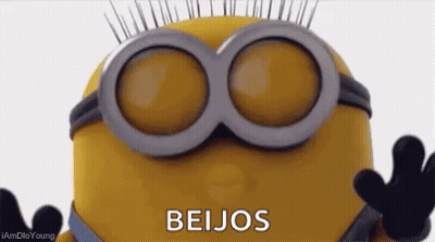 Minion Wearing Glasses Giving A Kiss GIF