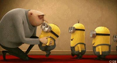 Minions Standing Next To Man Kissing One GIF