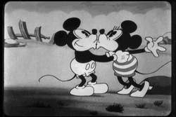Minnie Mouse Hugging And Kissing Mickey Mouse GIF
