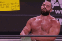 Miro Showing Off Championship Belt GIF