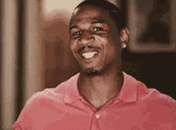Mischievous Smile African Man GIF