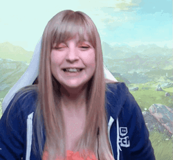 Mischievous Smile Hand Heart GIF