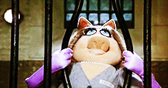 Miss Piggy Bending Bars GIF
