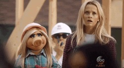 Miss Piggy Bumping A Woman GIF