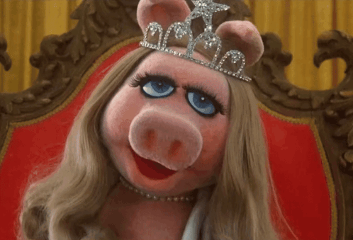 Miss Piggy Is Wearing A Tiara And A Necklace GIF