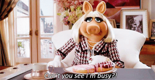 Miss Piggy Sitting At Table With Food And Coffee GIF