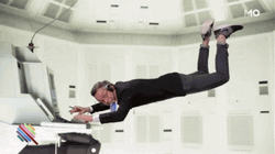 Mission Impossible Man Floating While Working GIF