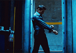 Mission Impossible Man Stretching Arms GIF