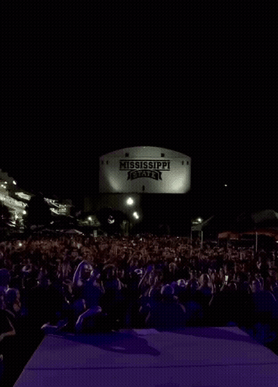 Mississippi State Sign Over Crowd At Night GIF