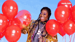 Missy Elliot Popping Balloons GIF