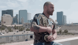 Mix Martial Artist Cédric Doumbé Showing Belt GIF