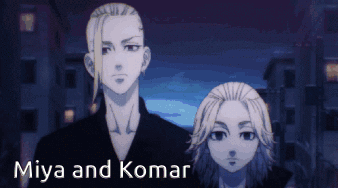 Miya And Komar Are Standing Next To Each Other GIF
