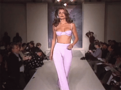 Model Walking Runway In Purple Pants And Bra GIF