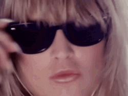 Modelo Taking Of Her Sunglasses GIF