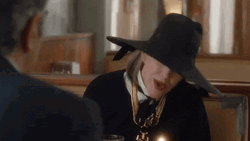 Moira Rose Blowing Candle GIF