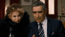 Moira Rose Sly Look GIF