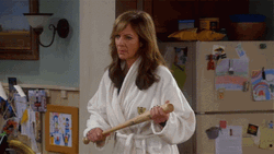 Mom In Bathrobe Baseball Bat GIF